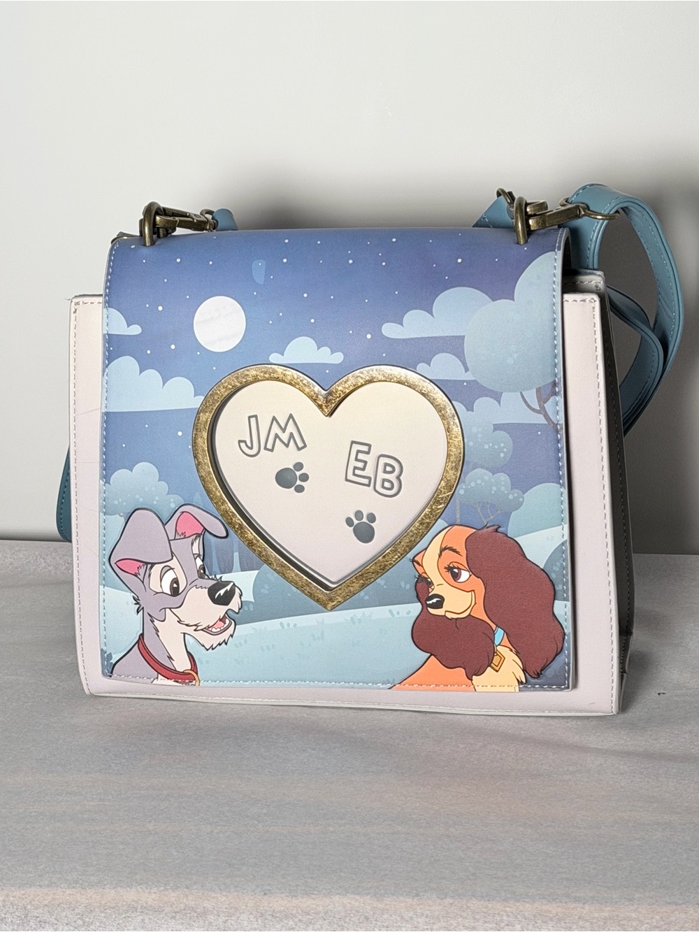 LOUNGEFLY DISNEY LADY AND THE TRAMP CROSSBODY PURSE HEARTS WET CEMENT PAW